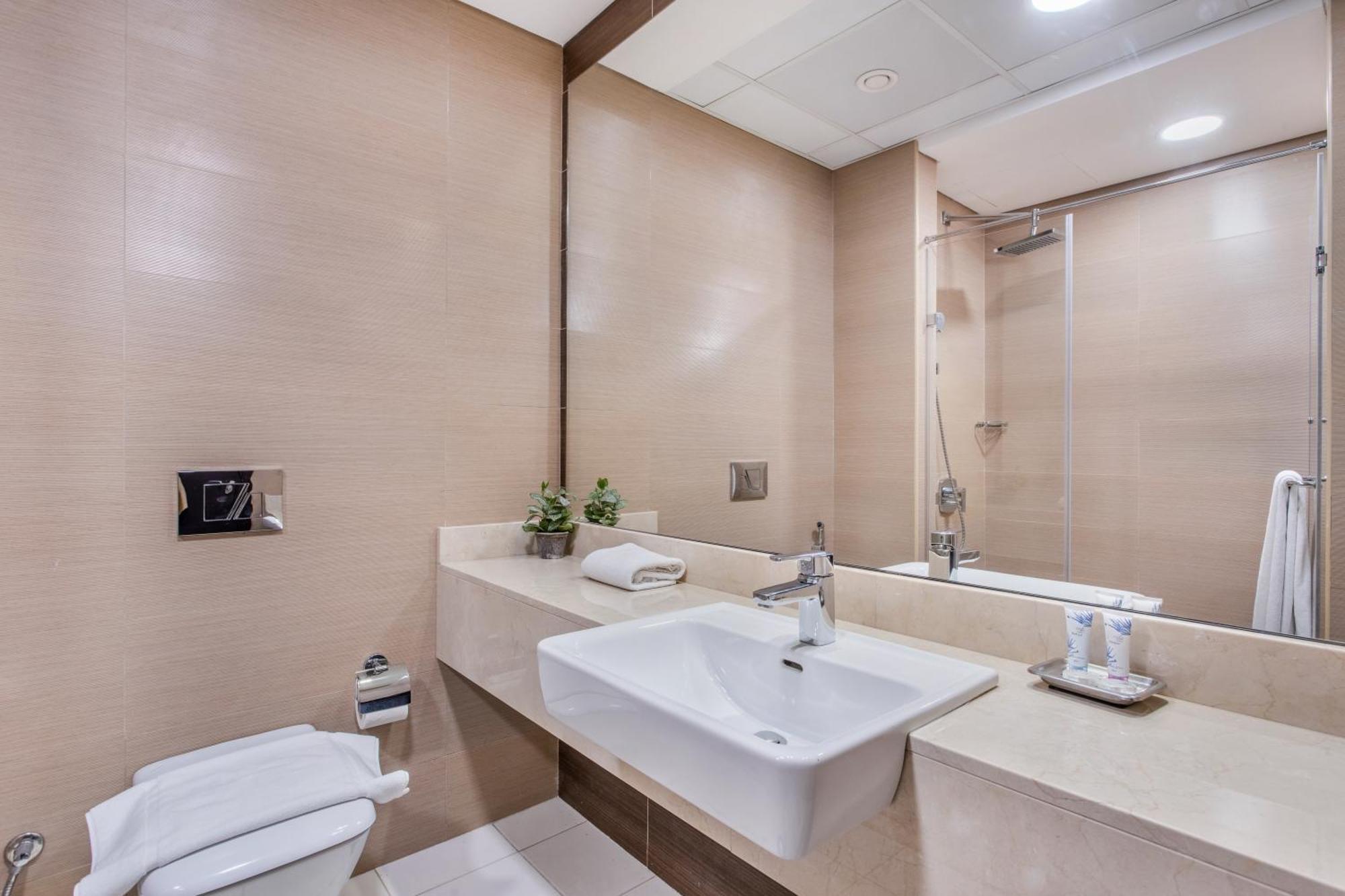 Апартаменты Icon Casa Living - Sparkle Tower 1 Дубай Экстерьер фото